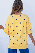 Yellow polka dot print oversized tee from Dear-Lover Dropshipping with crossed seam detail, made of polyester and elastane.