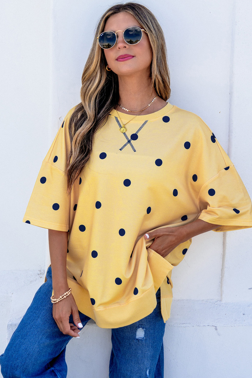Yellow polka dot print oversize tee from Dear-Lover with crossed seam detail, made of polyester and elastane, relaxed fit.
