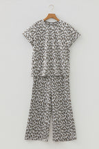Beige leopard print casual tee and pants two-piece set by Dear-Lover, comfortable polyester-elastane fabric, stylish loungewear ensemble.