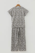 Beige leopard print casual tee and pants two-piece set by Dear-Lover, comfortable polyester-elastane fabric, relaxed fit.