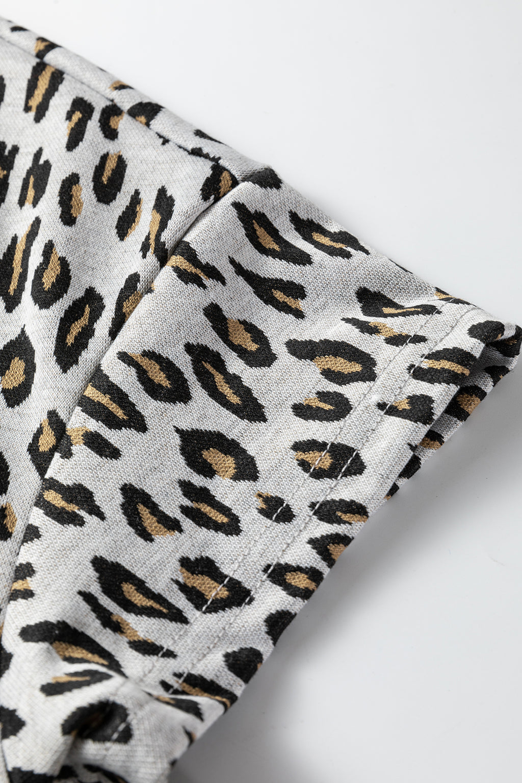 Beige leopard print casual tee and pants two-piece set by Dear-Lover, soft polyester and elastane fabric, comfortable and stylish.
