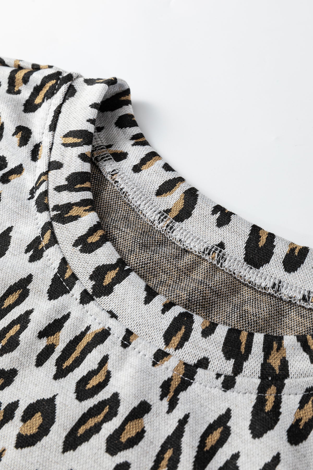 Beige leopard print casual tee and pants two-piece set by Dear-Lover, featuring comfortable polyester-elastane fabric.