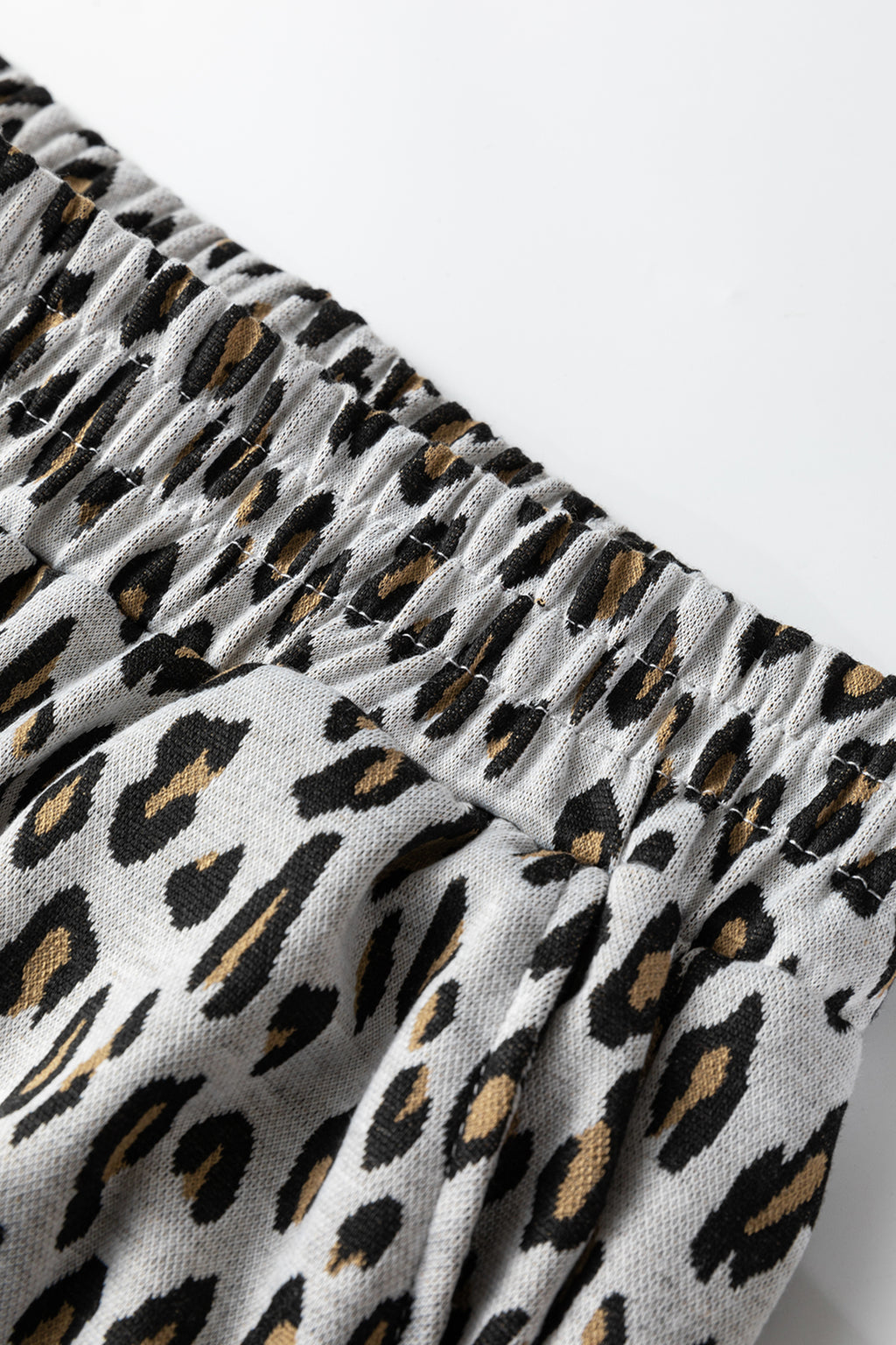 Beige leopard print casual tee and pants set by Dear-Lover, two-piece outfit with polyester and elastane, comfortable and stylish.