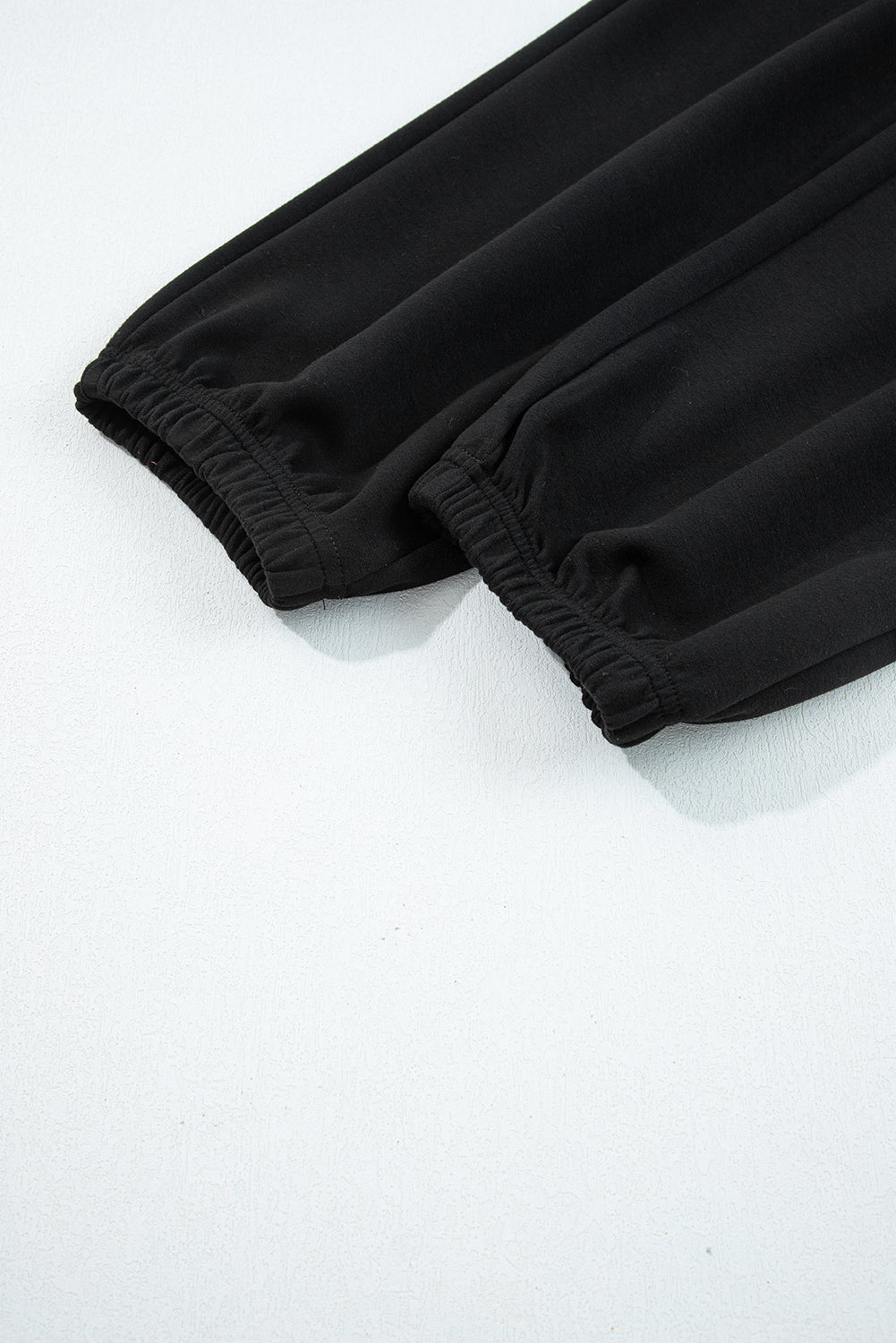 Black zip collar long sleeve top and drawstring pants set from Dear-Lover, stylish two-piece polyester and viscose outfit.