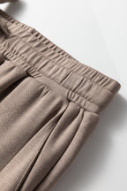Black zip collar long sleeve top and drawstring pants set by Dear-Lover, two-piece polyester and viscose fabric.