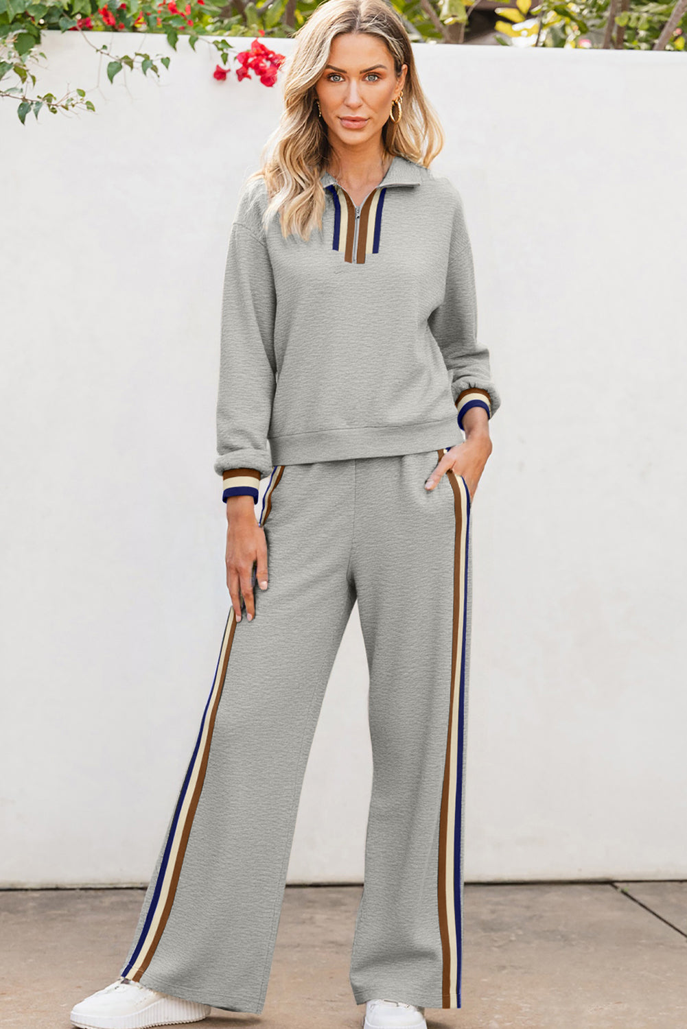 Striped patchwork quarter zip pullover and loose pants set by Dear-Lover, black two-piece polyester and viscose pant set.