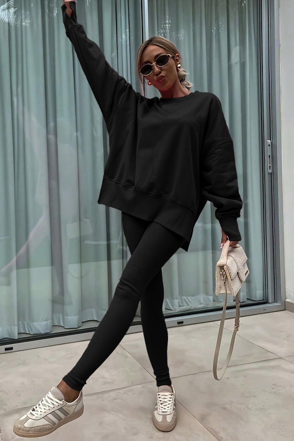 Black solid color oversized slit sweatshirt and ribbed leggings two-piece set by Dear-Lover, casual loungewear for women