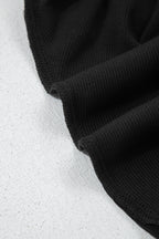 Black solid color oversized slit sweatshirt and ribbed leggings two-piece set by Dear-Lover, casual and comfortable clothing ensemble.