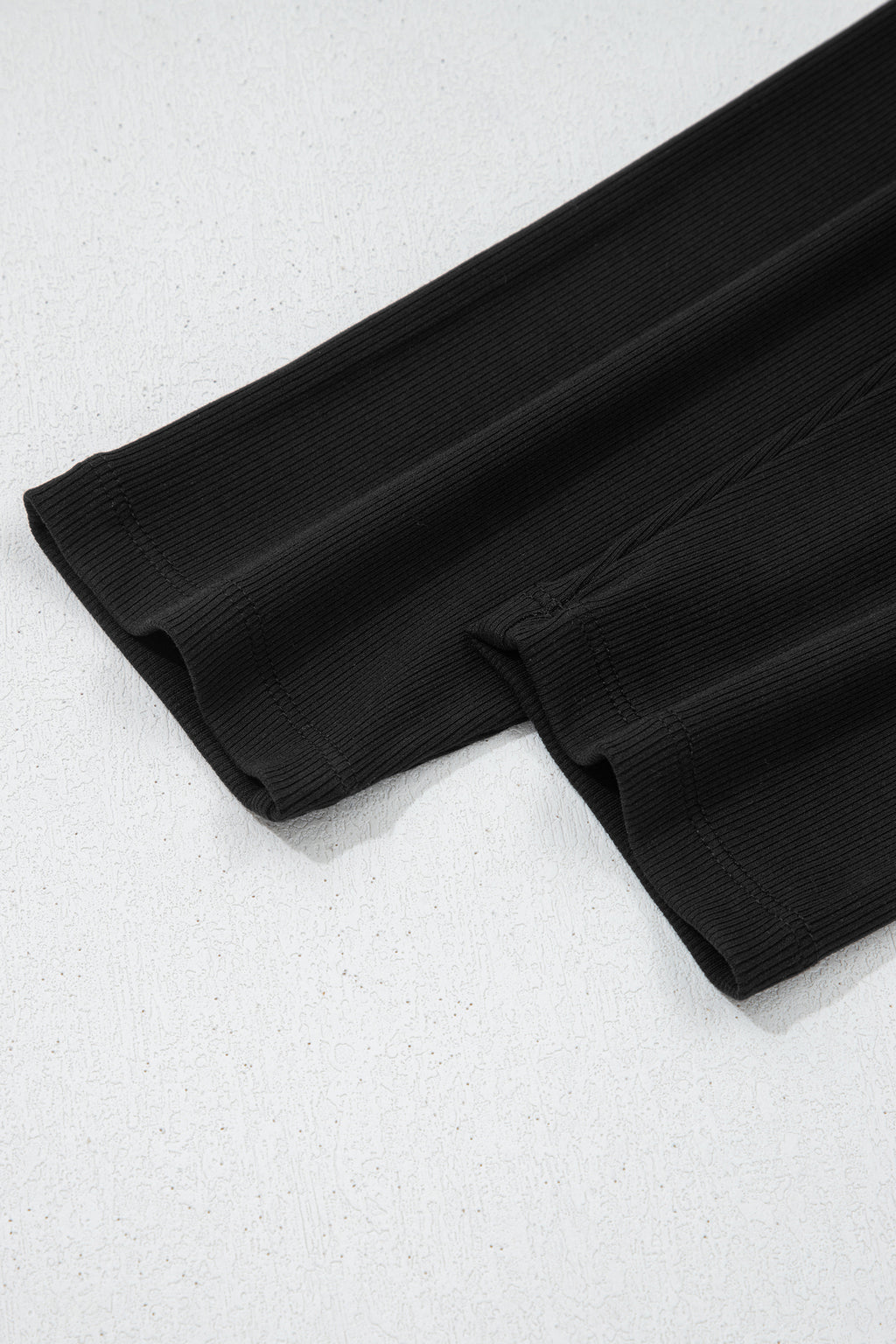 Black solid color oversized slit sweatshirt with ribbed leggings two-piece set by Dear-Lover, casual comfortable loungewear ensemble.