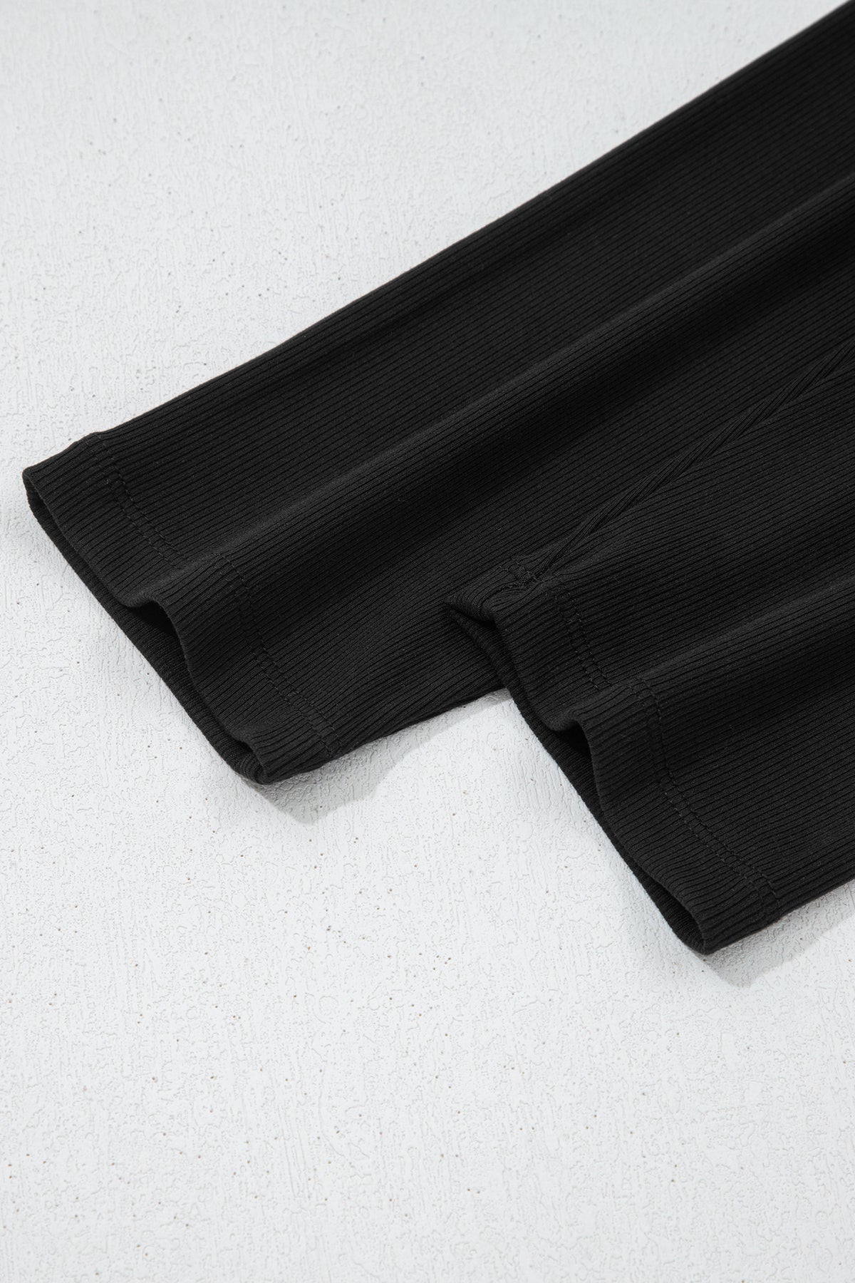 Black solid color oversized slit sweatshirt with ribbed leggings two-piece set by Dear-Lover, casual comfortable loungewear ensemble.