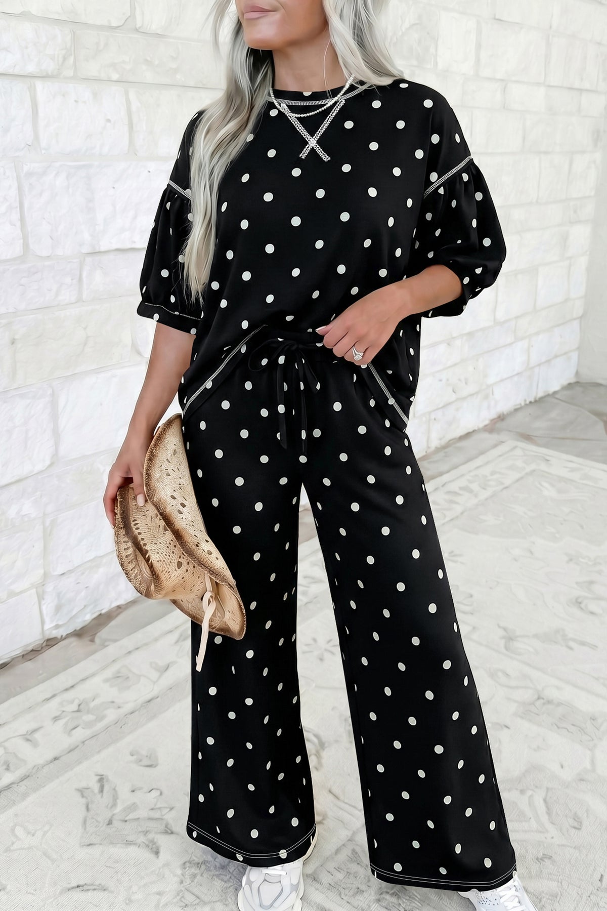 Black polka dot two-piece set with a loose half-sleeve top and elastic waist casual pants by Dear-Lover.