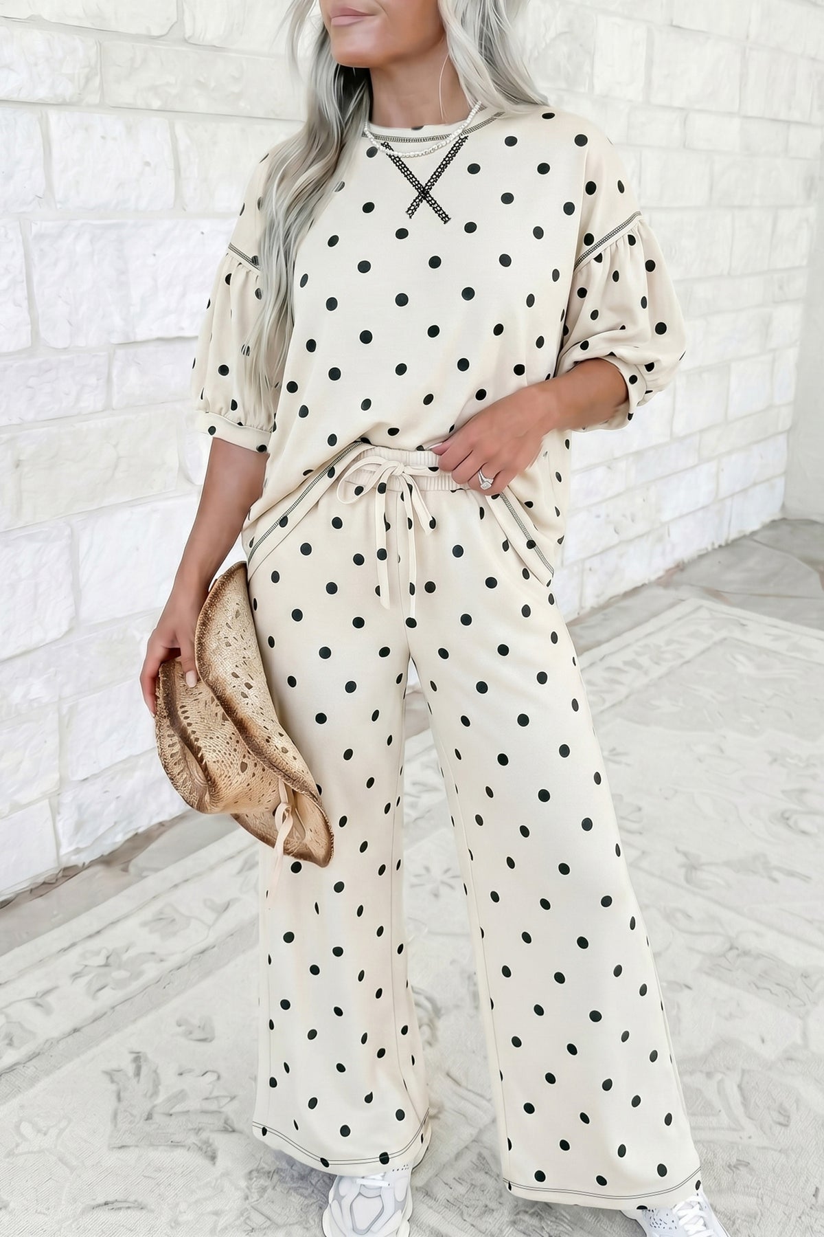 Black polka dot two-piece set with a half-sleeve loose top and elastic waist casual pants by Dear-Lover Dropshipping.