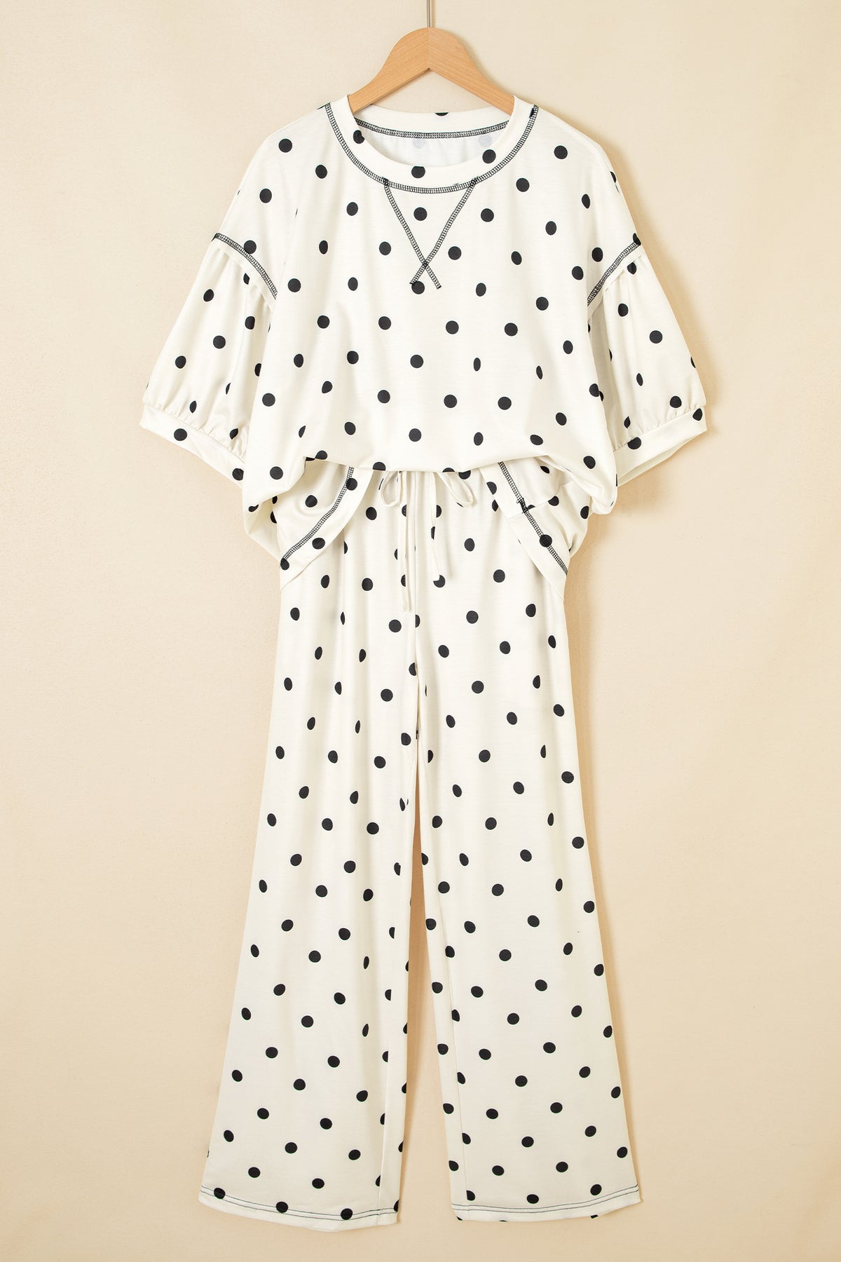 Black polka dot two-piece set with a loose half-sleeve top and elastic waist casual pants from Dear-Lover.