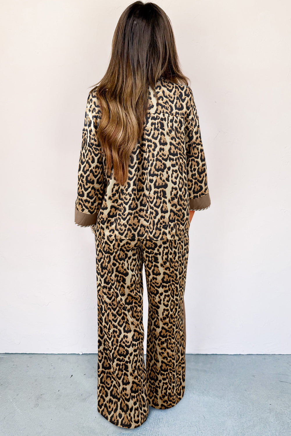 Brown leopard print two-piece outfit set with collared 3/4 sleeve shirt and loose pants, by Dear-Lover Dropshipping.