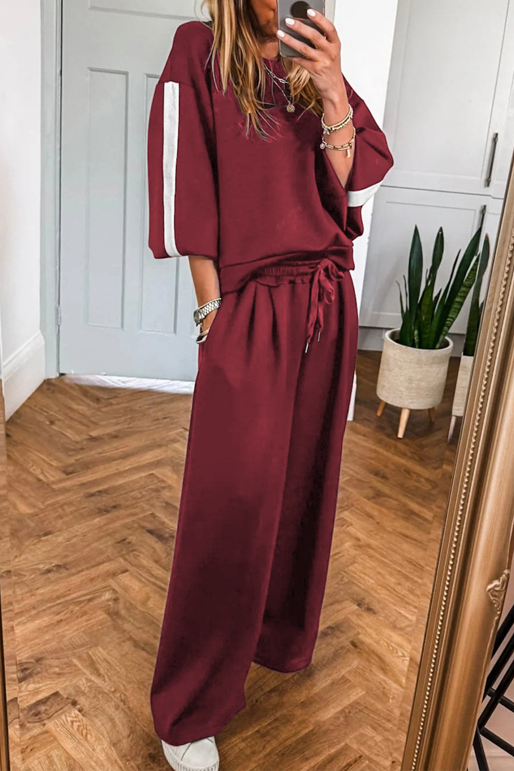 Burgundy varsity striped 3/4 sleeve pullover and drawstring sweatpants set by Dear-Lover, two-piece pant set in polyester and cotton.