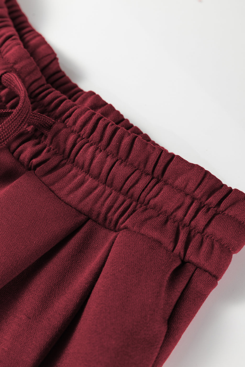 Burgundy varsity striped 3/4 sleeve pullover and drawstring sweatpants set by Dear-Lover, two-piece pant set in polyester and cotton.