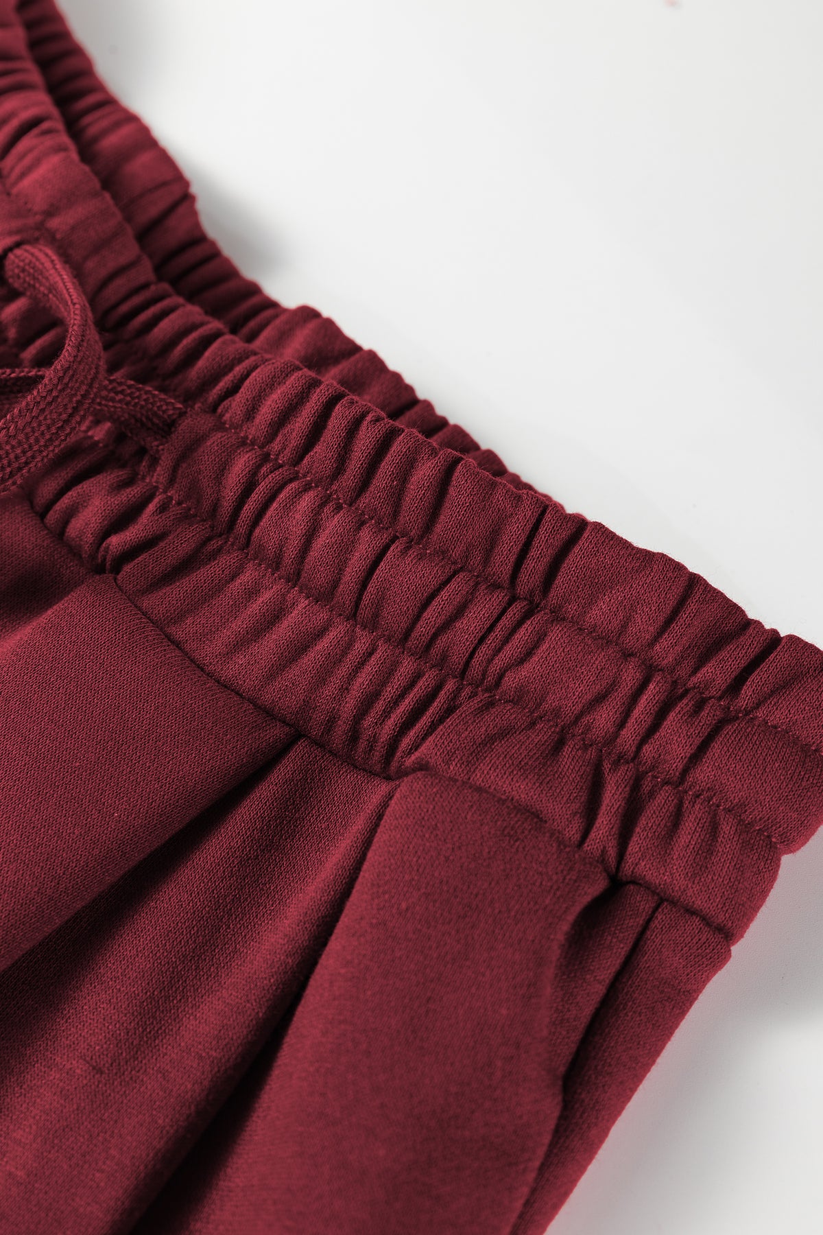 Burgundy varsity striped 3/4 sleeve pullover and drawstring sweatpants set by Dear-Lover, two-piece pant set in polyester and cotton.