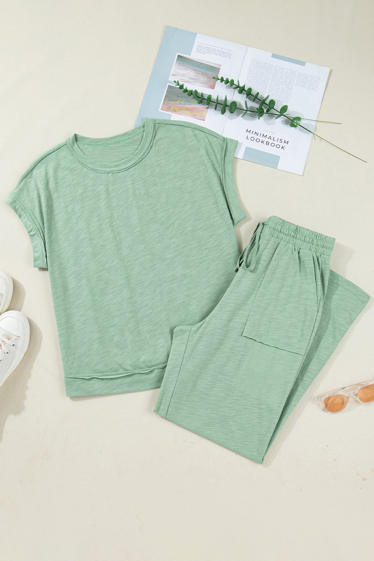 Dear-Lover two-piece set with cuffed short sleeve tee and drawstring pants, featuring raw seams and patch pockets, in polyester-cotton fabric.