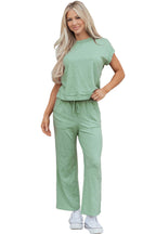 Dear-Lover two-piece set featuring a Canton cuffed short sleeve tee with raw seam patch pocket and drawstring pants.