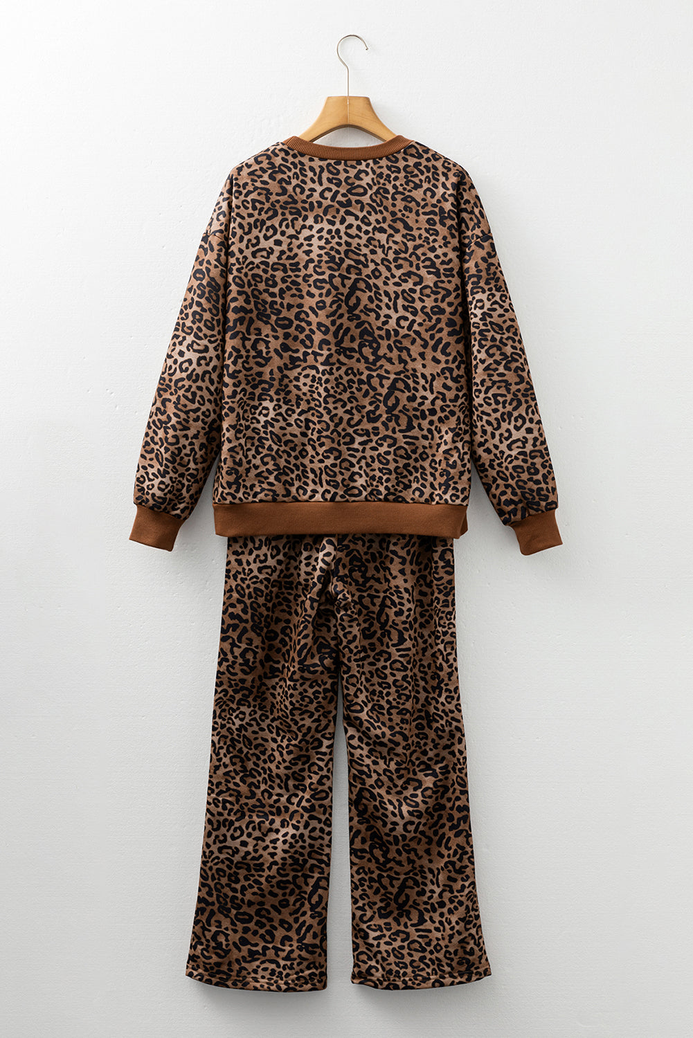 Coffee leopard print two-piece set by Dear-Lover with contrast trim, featuring long sleeve top and matching pants in polyester fabric.