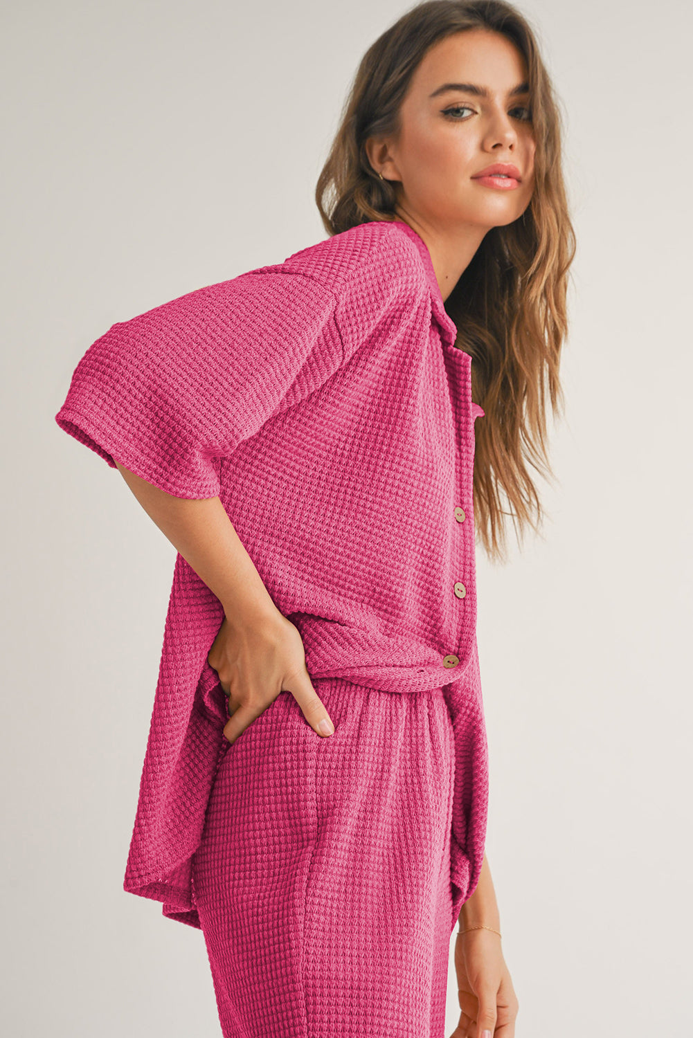 Rose red textured buttoned shirt and casual pants set by Dear-Lover, featuring a stylish two-piece outfit with a textured fabric design.
