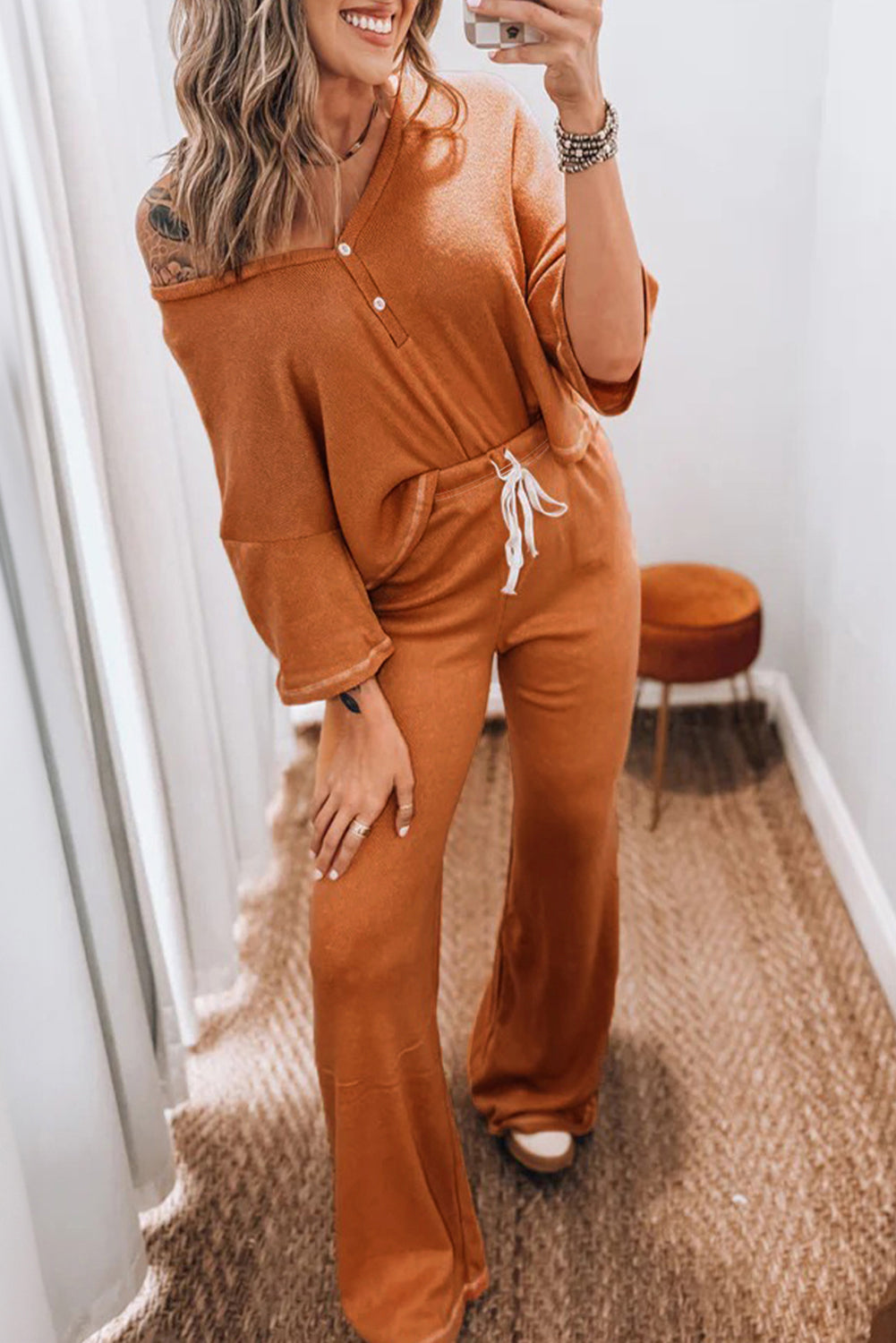 Grapefruit orange two-piece set featuring a contrast stitching buttoned V-neck half-sleeve top and drawstring flare pants by Dear-Lover