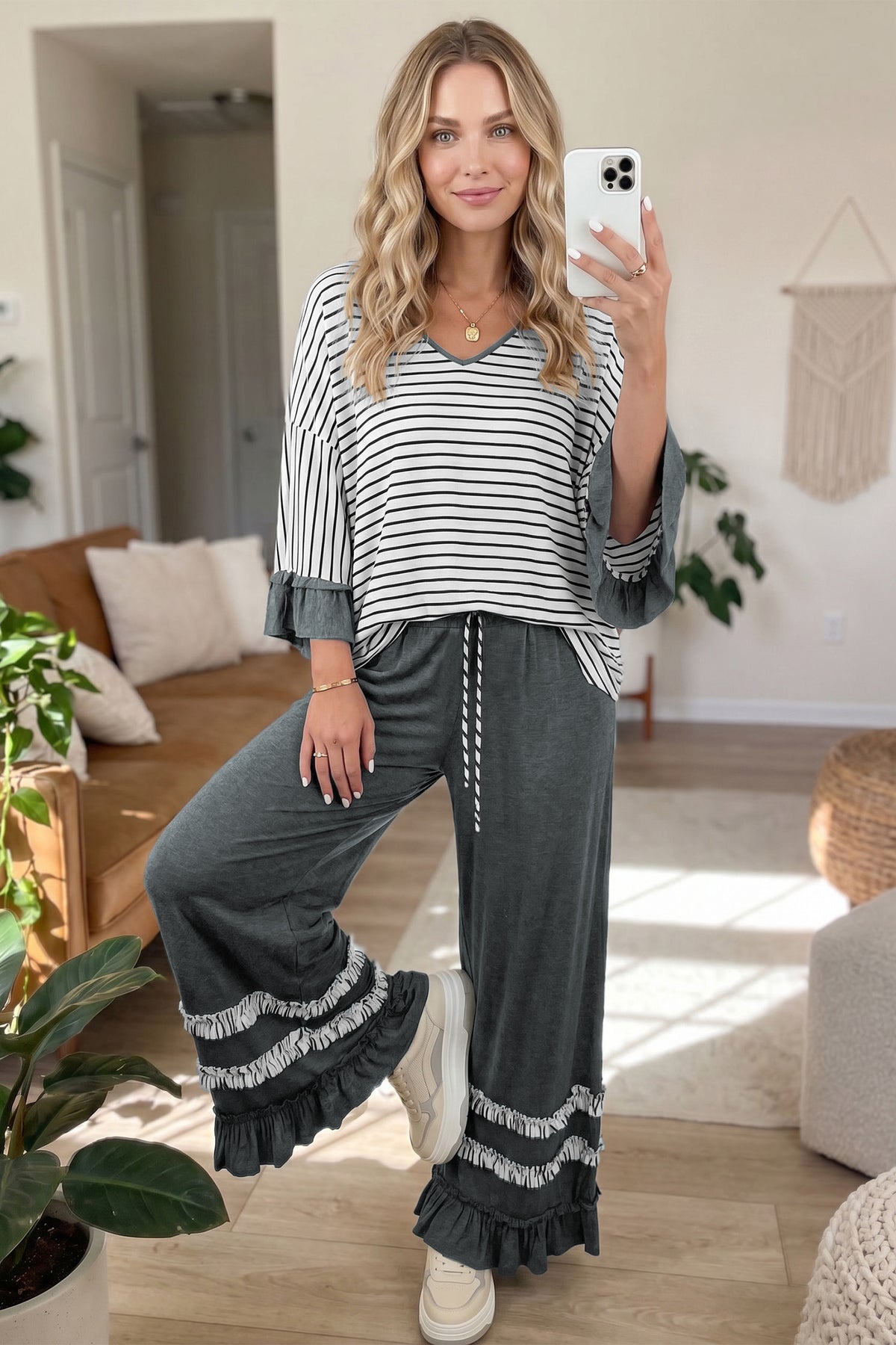 Gray stripe two-piece set featuring a V-neck ruffle contrast sleeve top and drawstring pants, stylish and comfortable for casual wear.
