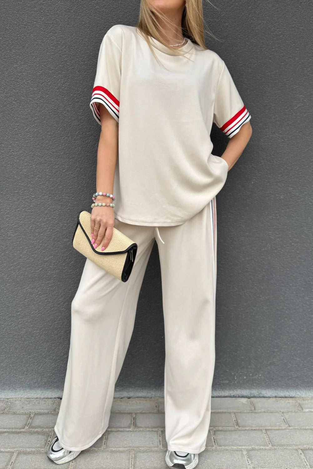 Dear-Lover jet stream contrast striped trim crewneck T-shirt and loose straight pants set, stylish two-piece outfit for casual wear.