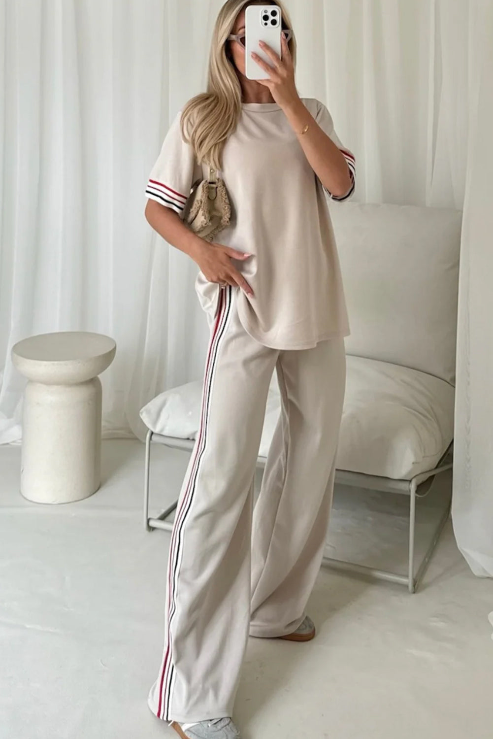 Dear-Lover Jet Stream contrast striped crewneck T-shirt and loose straight pants set in polyester, viscose, and elastane.