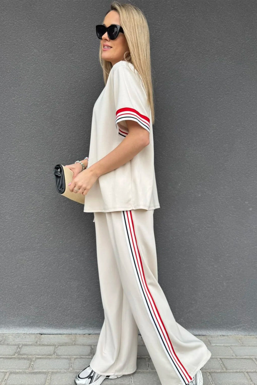 Dear-Lover two-piece set with contrast striped trim crewneck T-shirt and loose straight pants, polyester viscose blend.