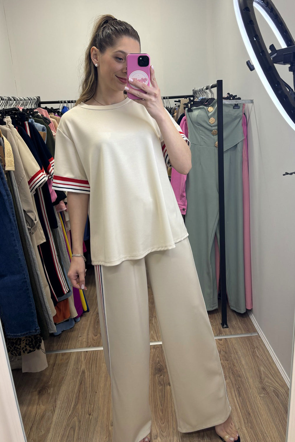 Dear-Lover two-piece set with contrast striped trim crewneck t-shirt and loose straight pants, made of polyester, viscose, and elastane.