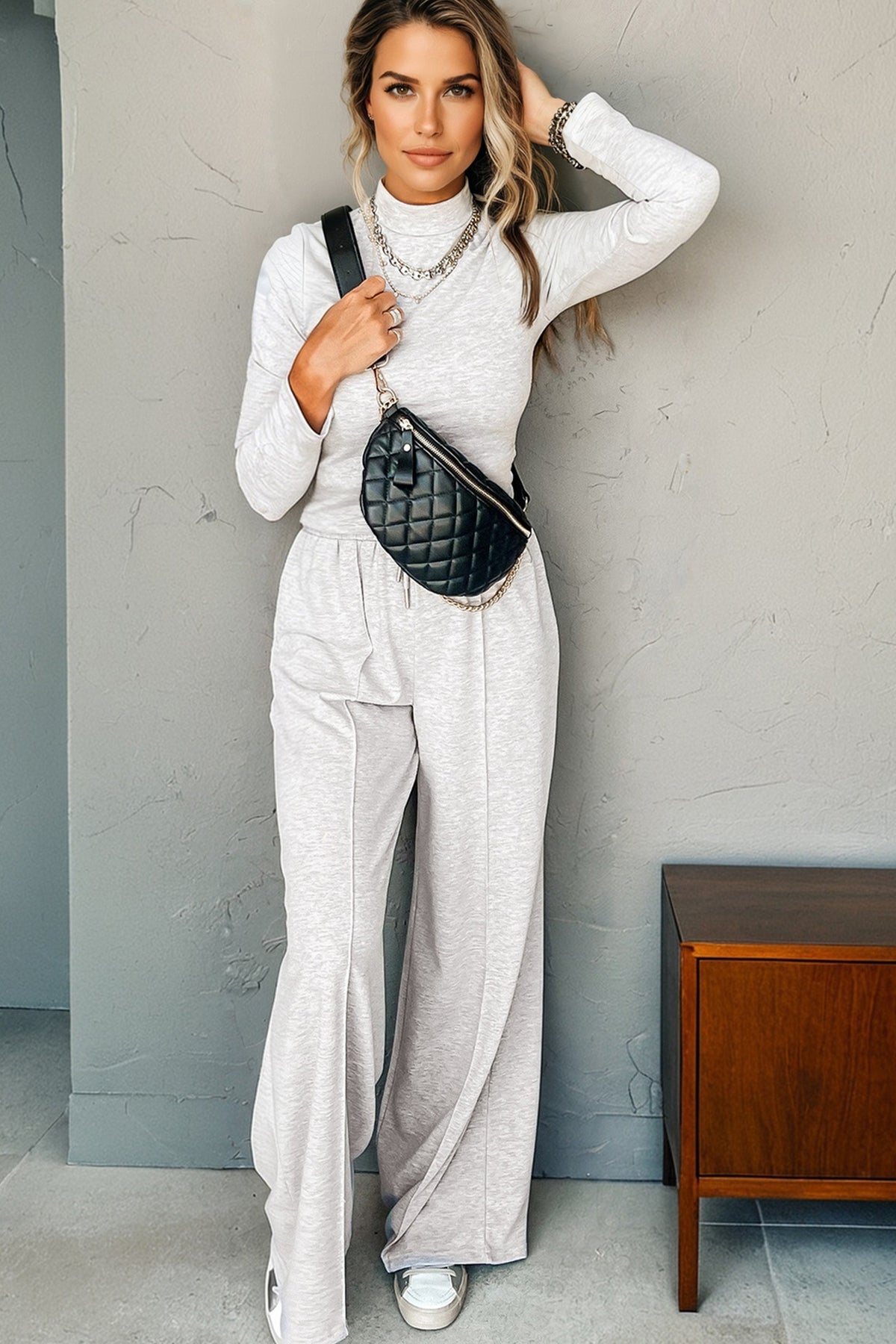 Light grey long sleeve high neck slim top with smocked waist, paired with matching pants in a Dear-Lover two-piece set.