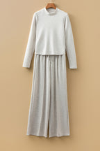 Light grey long sleeve high-neck slim top and smocked waist pants set by Dear-Lover, stylish two-piece outfit for casual wear.