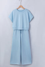 Mist Blue two-piece outfit with loose tee and wide-leg drawstring pants from Dear-Lover Dropshipping, polyester-cotton blend, casual style.