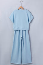 Mist Blue solid color two-piece set with loose tee and wide-leg drawstring pants from Dear-Lover, perfect for casual wear.
