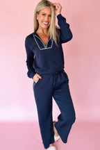 Navy blue contrast piping zipped pullover and cropped pants set by Dear-Lover, two-piece polyester-cotton casual outfit.