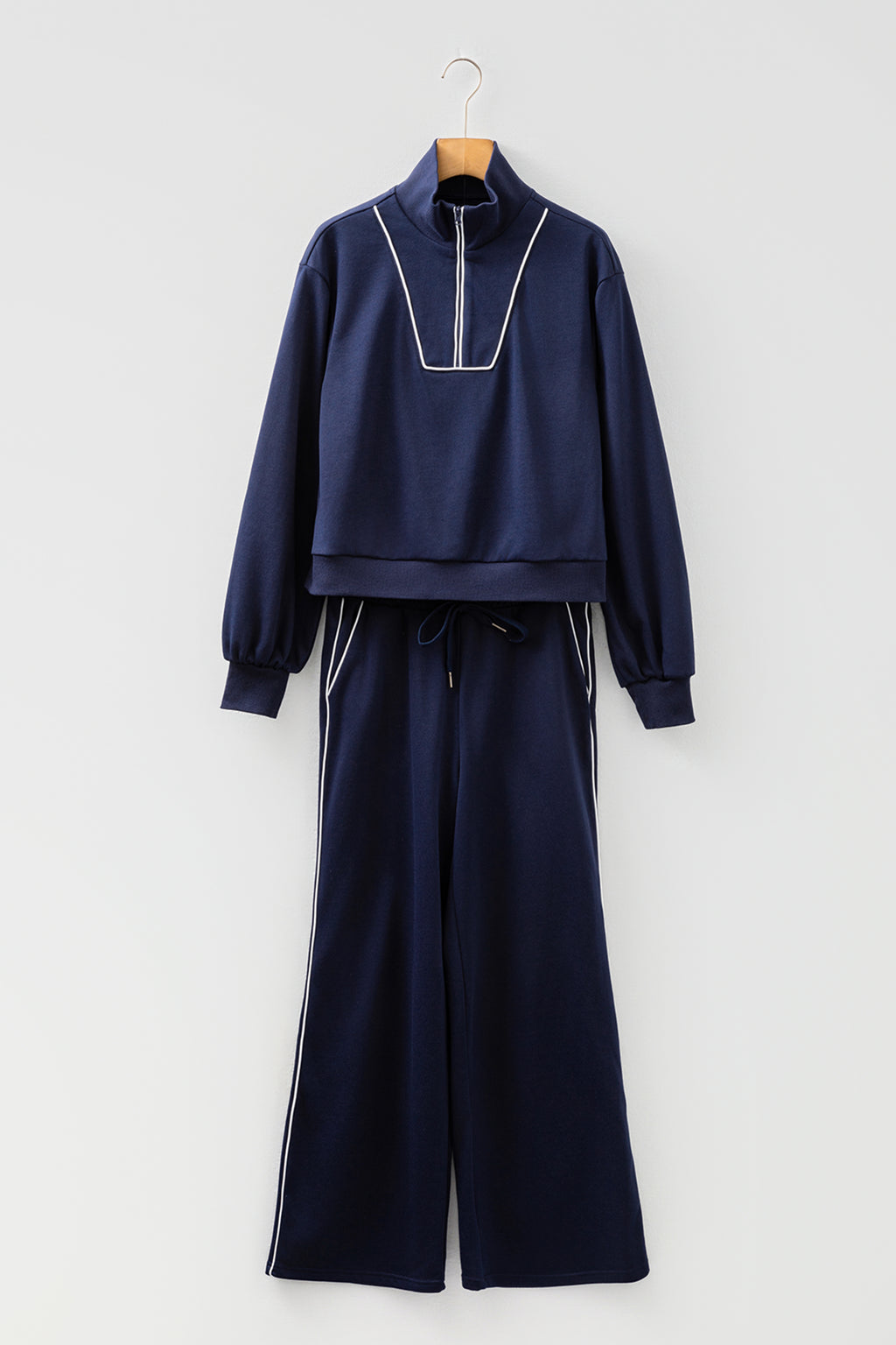Navy blue contrast piping zipped pullover and cropped pants set by Dear-Lover, two-piece polyester-cotton casual outfit.