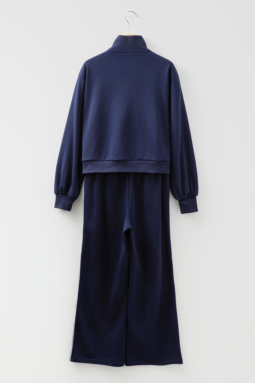 Navy blue contrast piping zipped cropped pants set by Dear-Lover, includes matching pullover and pants, made of polyester and cotton.