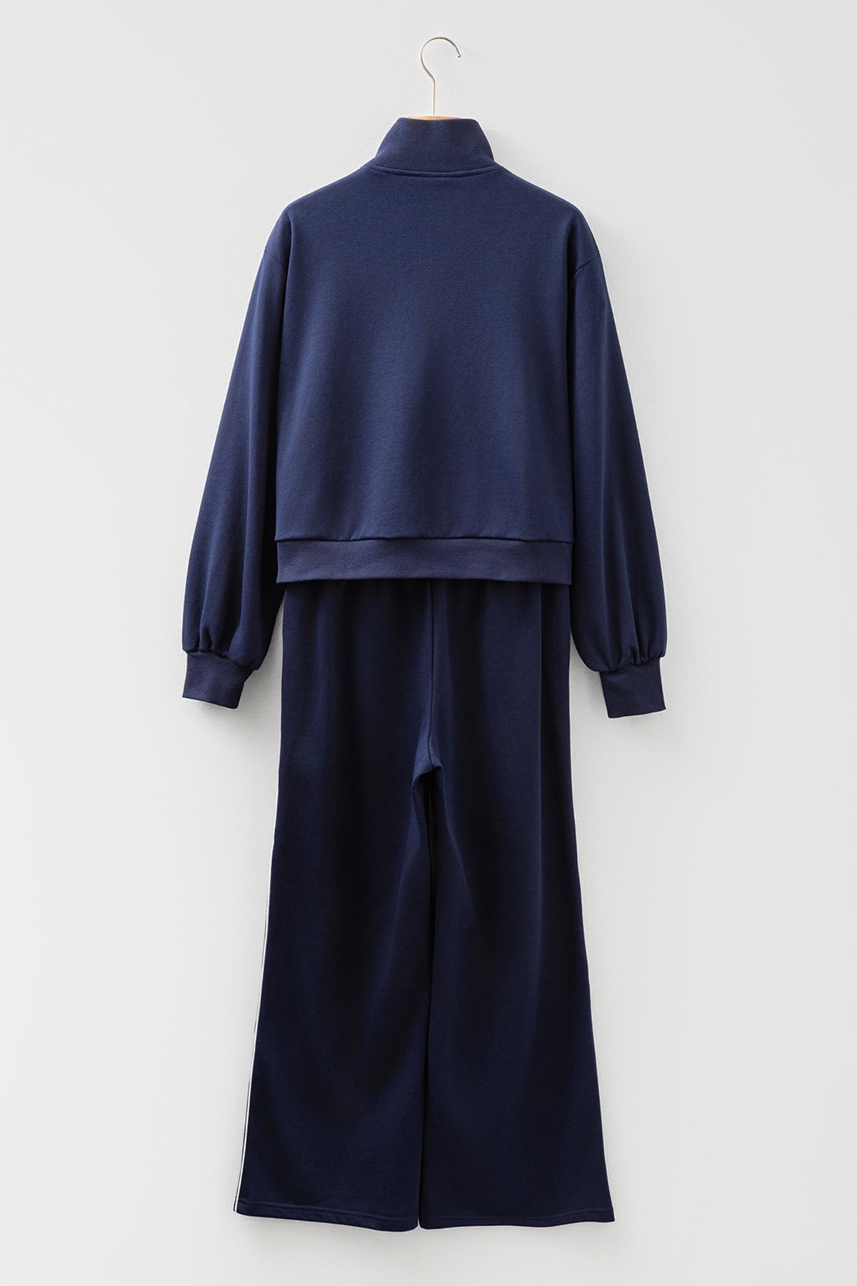 Navy blue contrast piping zipped cropped pants set by Dear-Lover, includes matching pullover and pants, made of polyester and cotton.