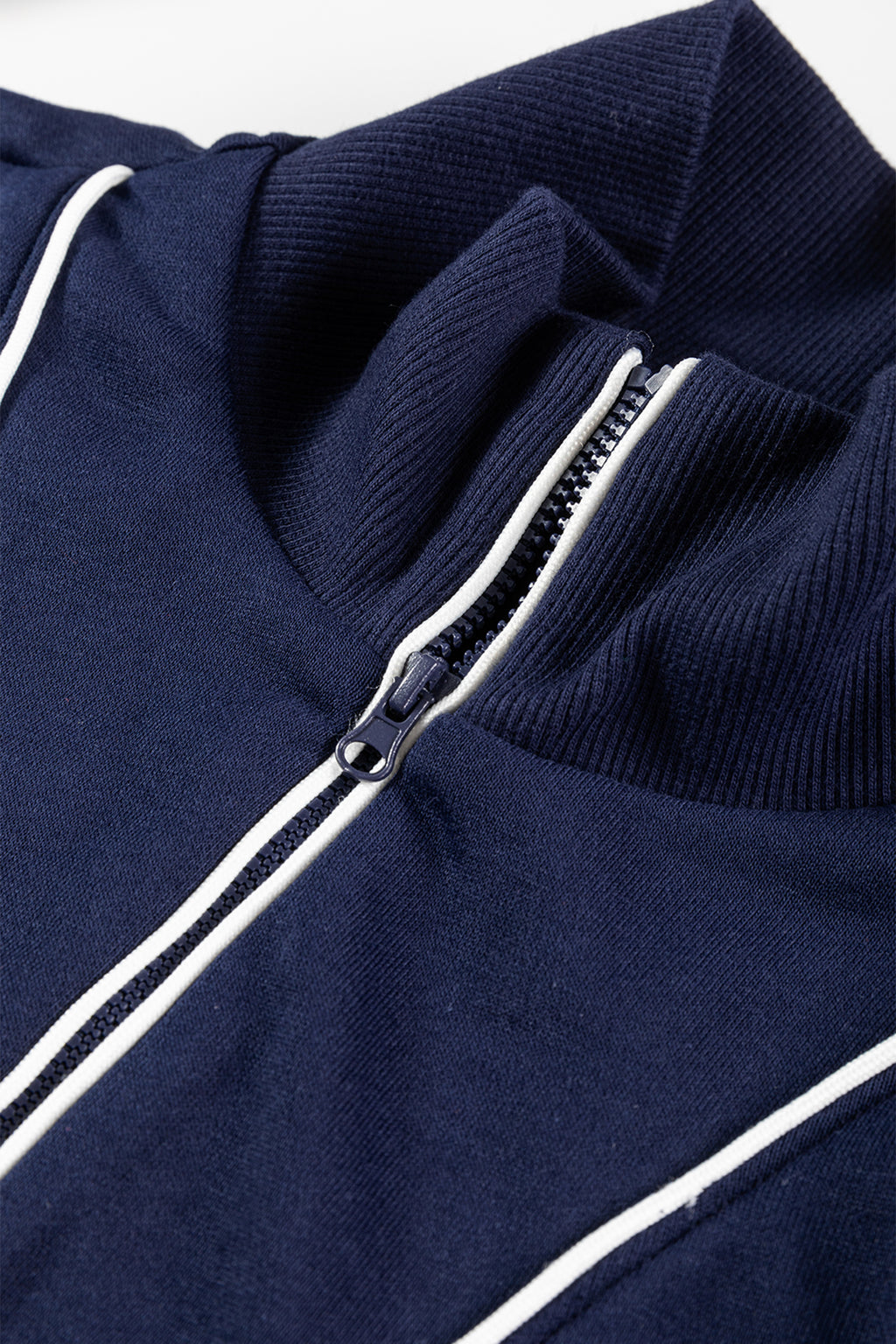 Navy blue contrast piping zipped pullover and cropped pants set by Dear-Lover, two-piece casual outfit with polyester and cotton fabric.
