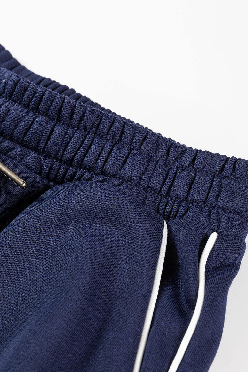Navy blue contrast piping zipped pullover and cropped pants set by Dear-Lover, stylish two-piece cotton-polyester casual outfit.