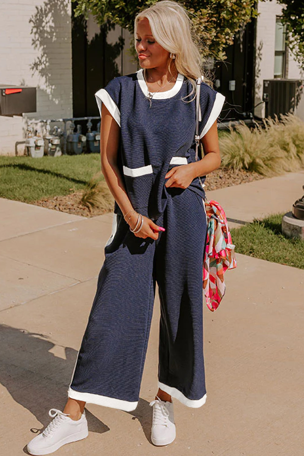 Black color block pocketed T-shirt and wide-leg pants set by Dear-Lover, casual two-piece outfit in navy blue with polyester, viscose, and elastane.