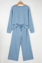 Navy blue ultra loose textured two-piece slouchy outfit set by Dear-Lover, featuring relaxed fit pants and top in polyester-elastane fabric.