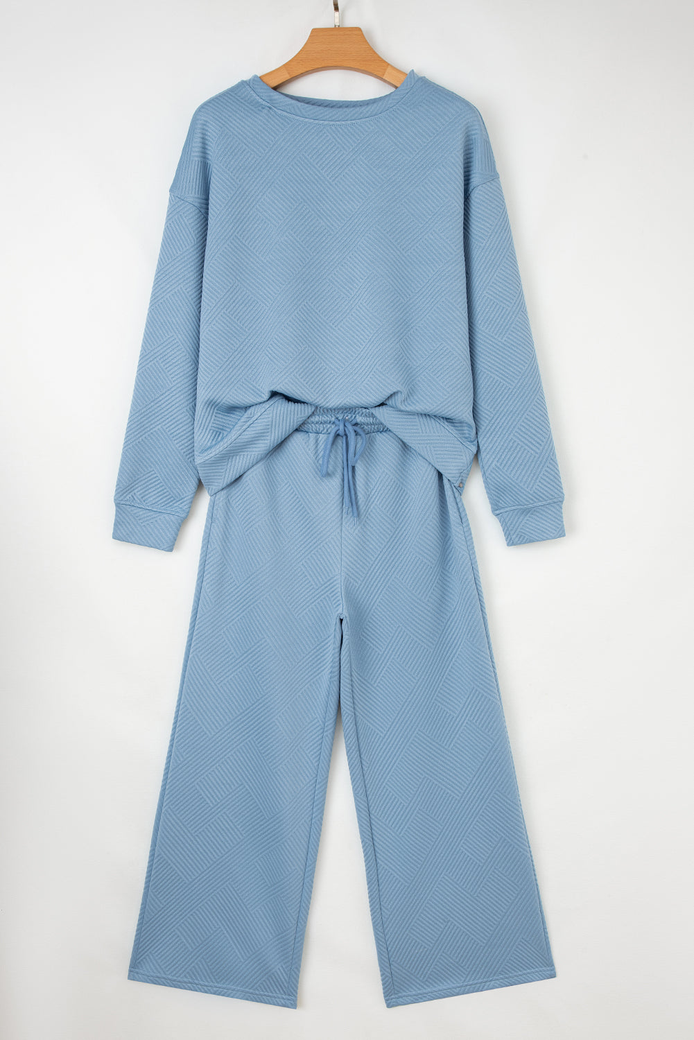 Navy blue ultra loose textured two-piece slouchy outfit set by Dear-Lover, featuring relaxed fit pants and top in polyester-elastane fabric.