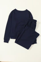 Navy blue ultra loose textured two-piece slouchy outfit by Dear-Lover, featuring relaxed-fit pants and top in polyester elastane fabric.