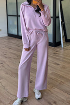 Dear-Lover Orchid Bouquet two-piece active set with half-zip hoodie and pants, featuring thumbhole sleeves, in polyester, viscose, and elastane.