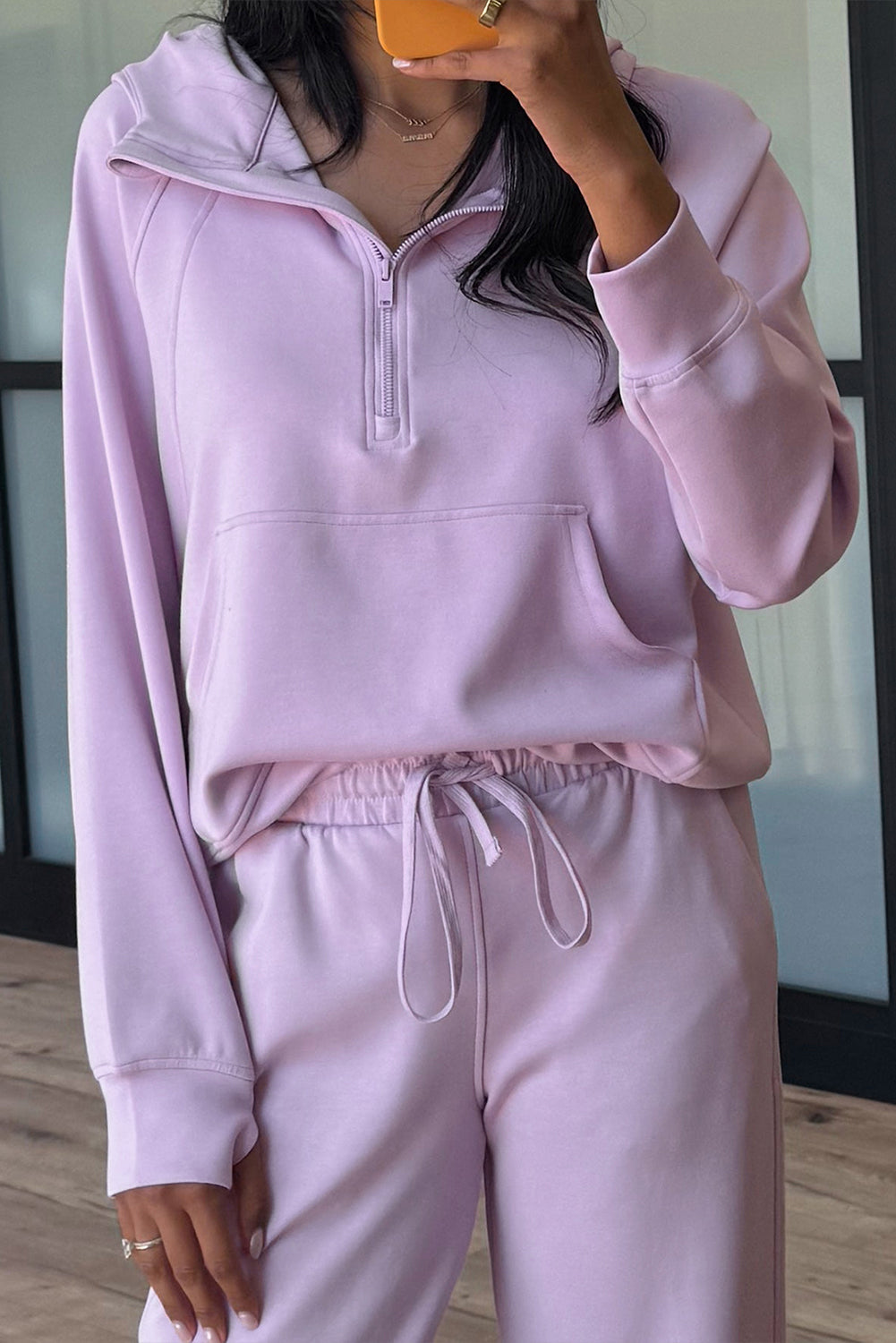Dear-Lover Orchid Bouquet two-piece active set with half-zip hoodie and pants, featuring thumbhole sleeves in polyester, viscose, and elastane.