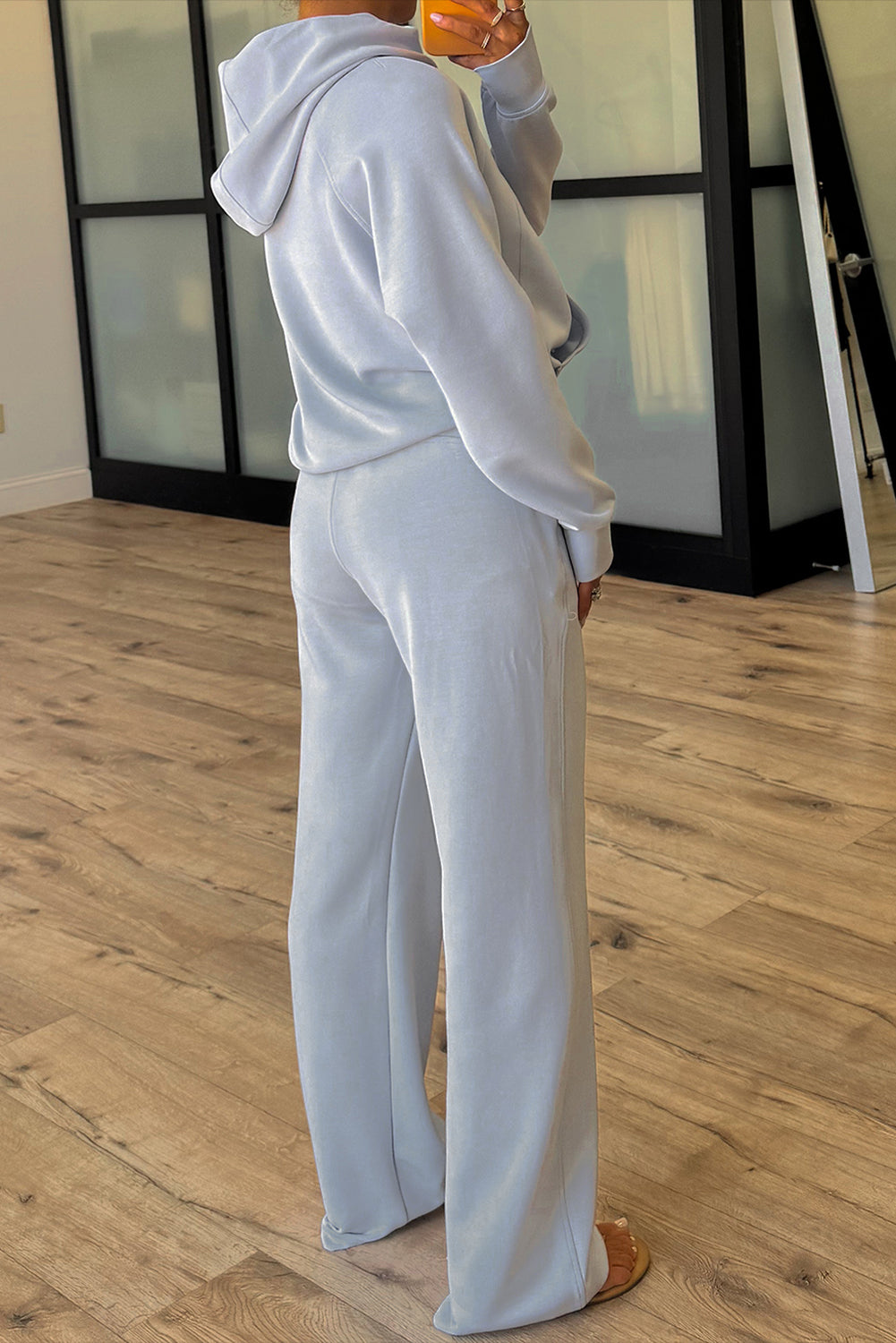 Dear-Lover Orchid Bouquet two-piece active hoodie and pants set with half-zip thumbhole sleeves, polyester, viscose, and elastane fabric.