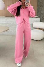 Pink solid color zip-up hoodie and loose pants two-piece set by Dear-Lover, made of polyester, viscose, and elastane.