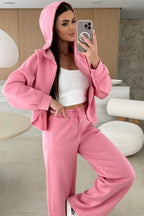 Pink solid color zip-up hoodie and loose pants set by Dear-Lover, made of polyester, viscose, and elastane, casual two-piece outfit.